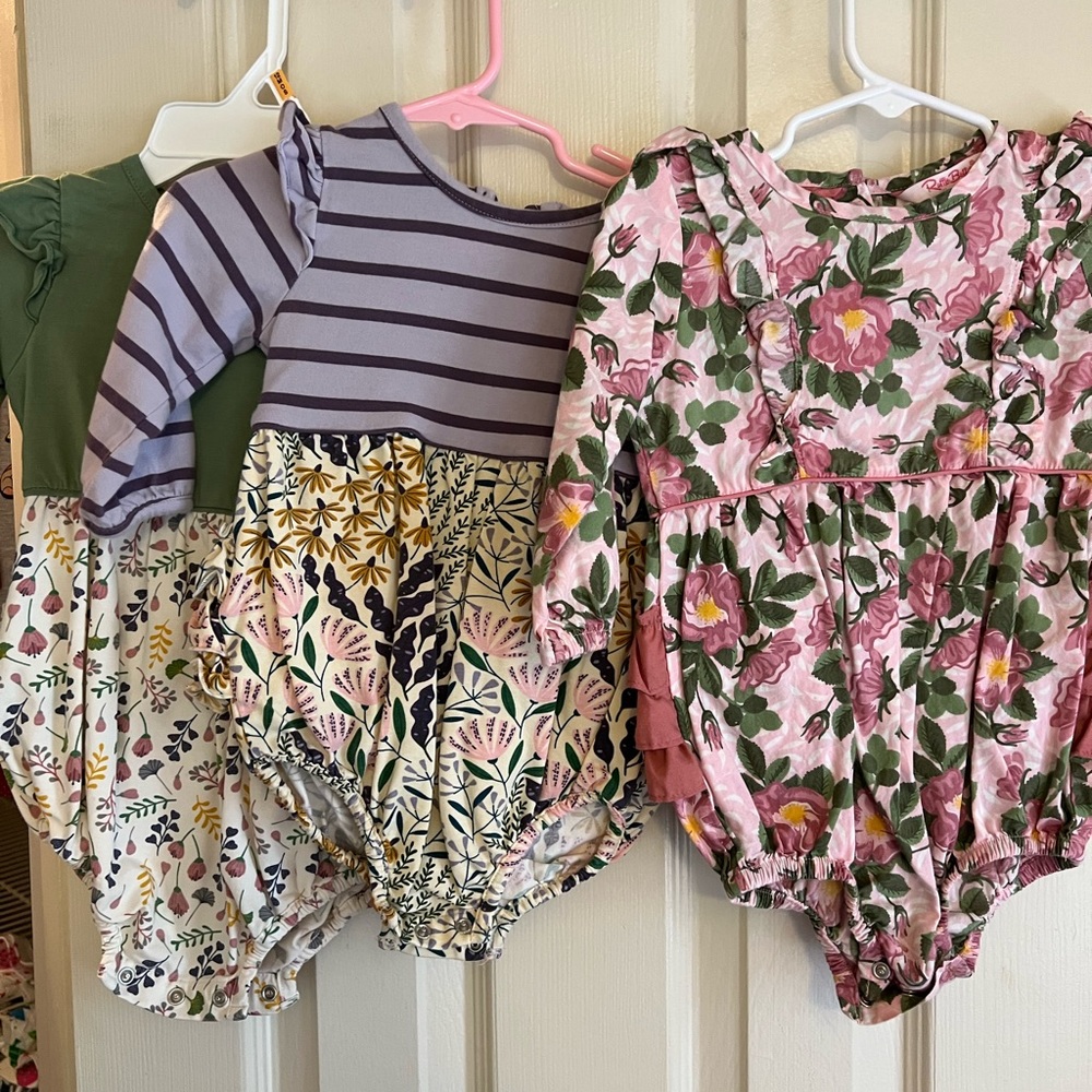 3 Ruffle Butt long sleeve bubbles with matching tights. 12-18m